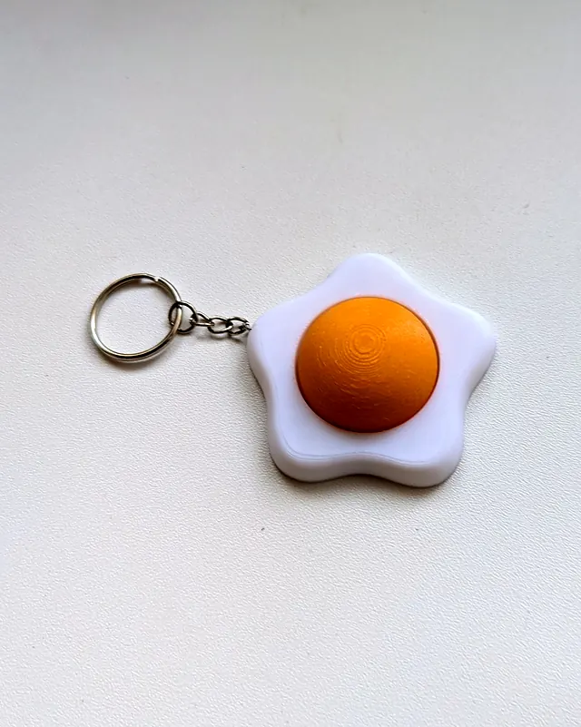 Llavero con forma de huevo frito